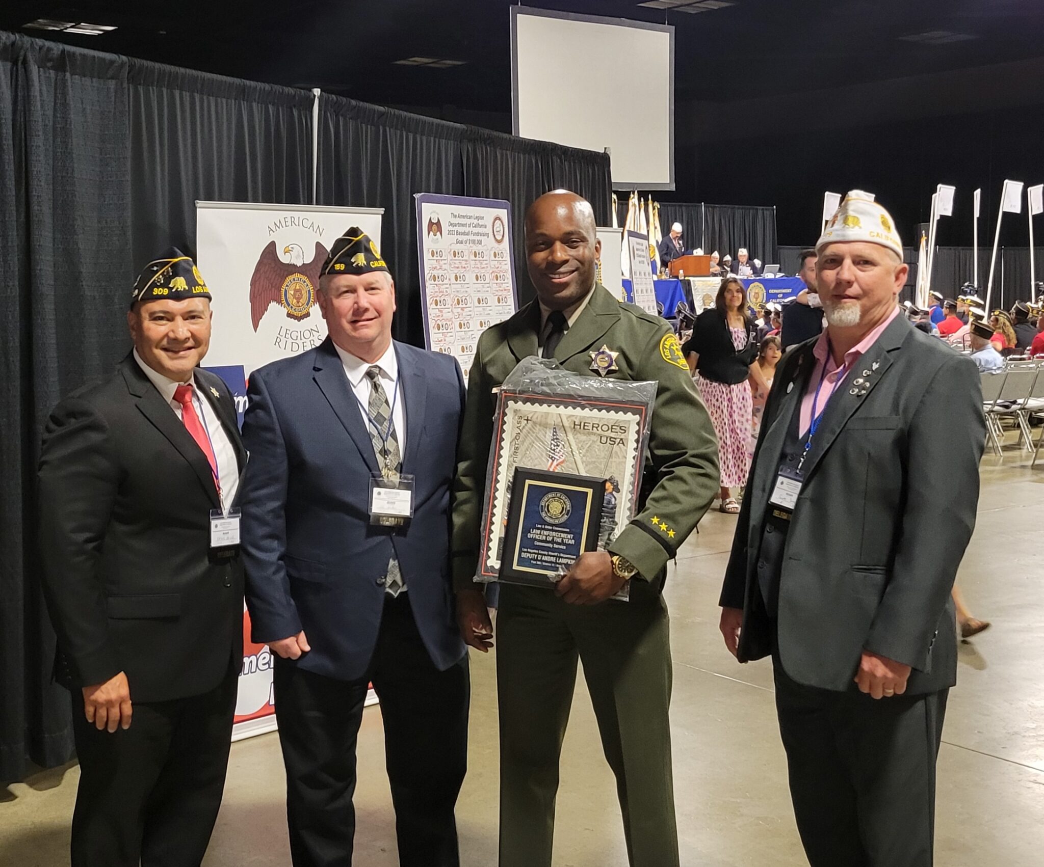 D'Andre Lampkin stands with American Legion California Department Law & Order Award committee members