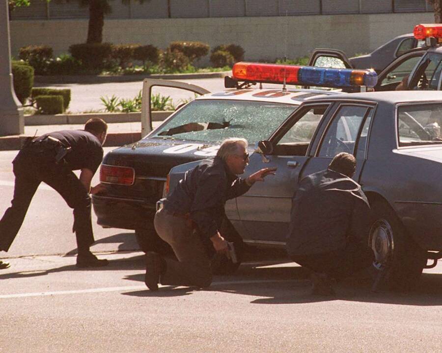 LAPD officers take cover during the 1997 North Hollywood Shootout, a turning point in modern policing.