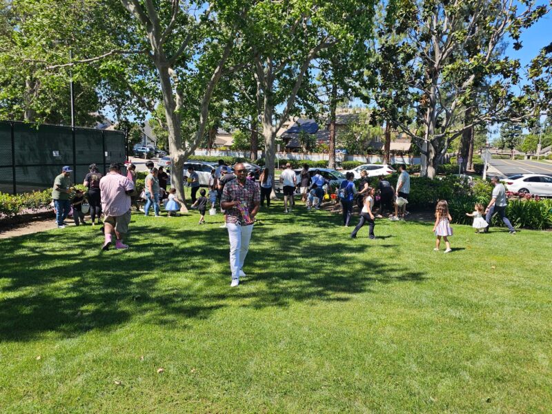 Children participating in Easter egg hunt at Creekside West Beach Club in Ontario California
