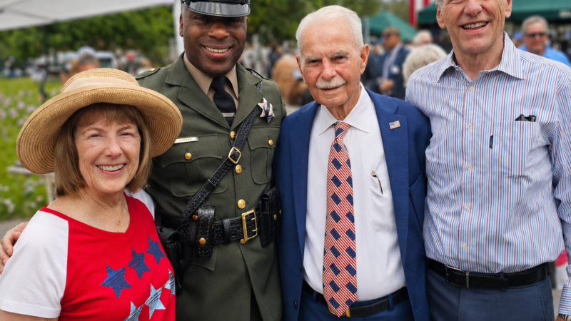 D’Andre D. Lampkin with civic leaders at a Memorial Day ceremony honoring the sacrifice behind our freedom.